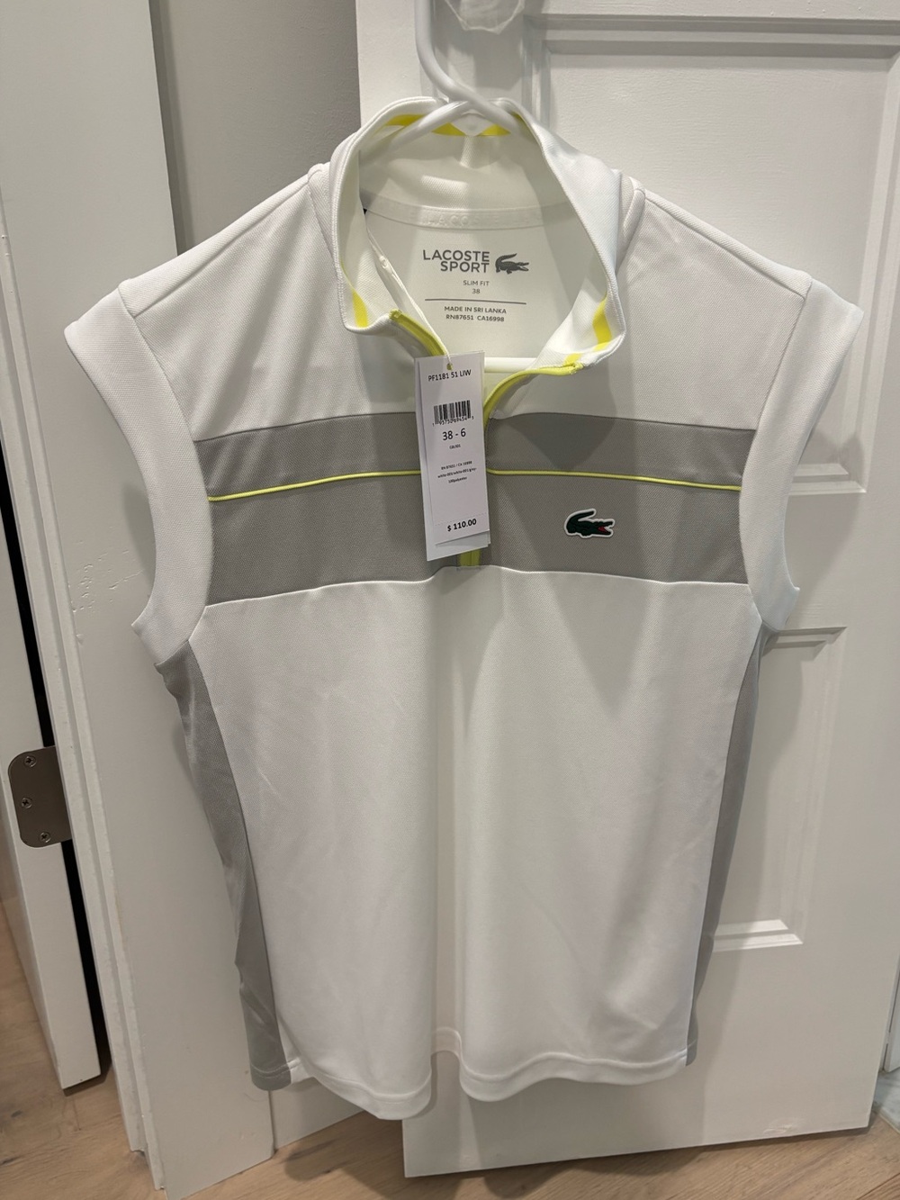 Lacoste Sport Women’s White & Gray Sleeveless Polo with Neon Trim